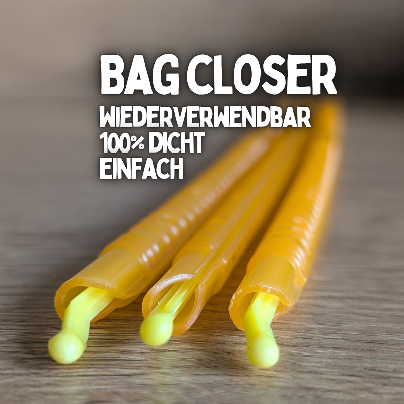 drei orange clips für dry ferm bag